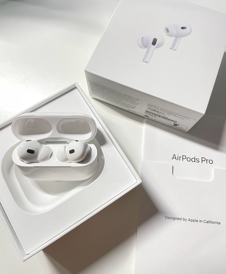 an apple airpods pro in its box and the packaging is open to reveal it's contents