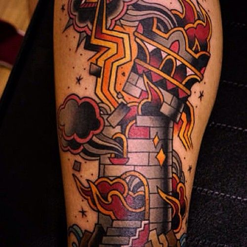 a man's leg with a tattoo on it that has an image of a fire hydrant