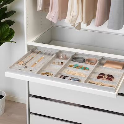 the drawers are organized and ready to be used for storing jewelry, bracelets, and other personal items