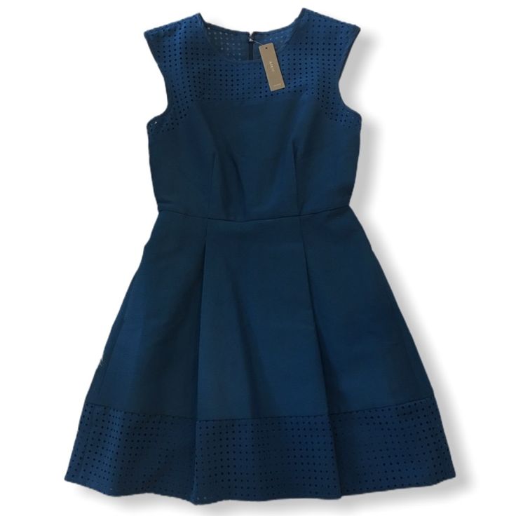 J.Crew Womens Teal Blue Perforated A-Line Dress Style #C0508 New With Tags Size Petite 0 Colors: Peacock Teal Blue Back Zipper Dress 76% Cotton, 24% Silk Chest And Hem: 89% Polyester, 11% Elastane Lining: 100% Polyester Dry Clean Great For Any Event Measurements Were Taken Laying Flat. See Photos Length: Approximately 32 Inches Under Arm To Under Arm Laying Flat: Approximately 15 Inches Waist: Approximately 12 1/2 Inches Flat Sleeveless Blue Workwear Dress, Blue Fit And Flare Sleeveless Dress For Spring, Spring Blue Fit And Flare Sleeveless Dress, Blue Knee-length Sleeveless Cocktail Dress, Blue Fit And Flare Sleeveless Dress, Blue Fit And Flare Dress For Work, Blue Sleeveless Fit And Flare Midi Dress, Blue Fit And Flare Sleeveless Midi Dress, Peacock Teal