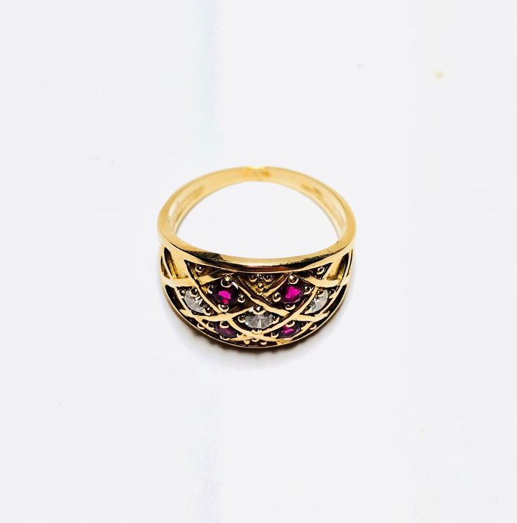 Absolutely Stunning Vintage 14k Yellow Gold Natural Ruby Diamond Ring 100% Natural Ruby and Diamonds Beautiful genuine Ruby Ruby: 0.40CT Diamond(s) .30CT Color: G Clarity: SI2 Total ring weight: 4.7GR 14K Yellow Gold Ring sizing available Free of Charge For more information regarding this item feel free to reach me so I can accommodate your needs. Thank you Elegant Red Dome Ring For Anniversary, Anniversary Multi-stone Dome Ring In Fine Jewelry Style, Yellow Gold Multi-stone Dome Ring, Exquisite Yellow Gold Hallmarked Rings, Fine Gold Multi-stone Ruby Ring, Yellow Gold Gemstone Filigree Ring, Yellow Gold Multi-stone Rings Fine Jewelry, Fine Jewelry Yellow Gold Multi-stone Ring, Formal Ruby Ring With Diamond Cut In Yellow Gold