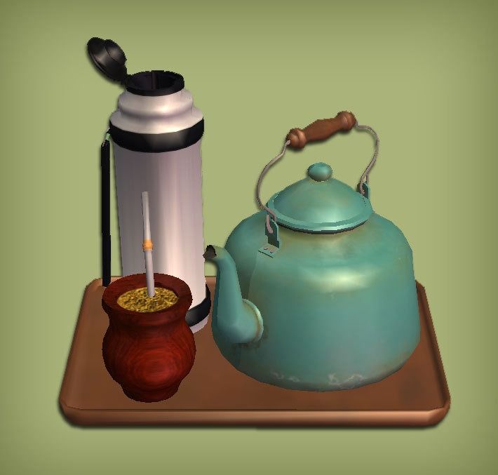 a tea kettle and cup on a tray