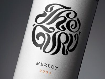 a bottle of merlot wine with the word merlot on it