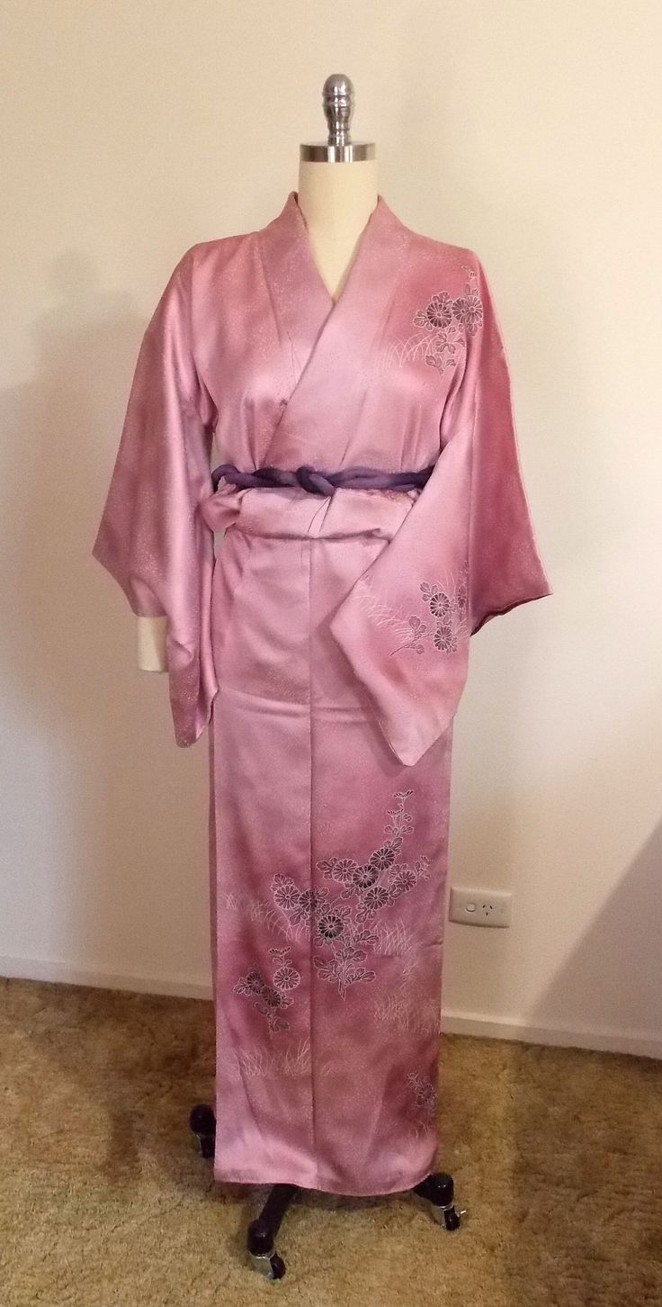 Gorgeous and lovely SAKURA pink silk semi formal TSUKESAGE KIMONO. It's so sweet and elegant. Suitable for a party, tea ceremony, robe or any relaxing Well hand sewing made. Age-2000~ Conditions- Excellent, the KAKE-ERI top ray collar has been removed. Slight stains - not noticed -on the front ( be hidden with OBI) and left sleeve bottom, pin-dot stain on the front. Material-silk figured crepe satin, chrysanthemum paint with embroidery partly. Lining-silk Size- Small *Please refer to finished me Pink Kimono With Kimono Sleeves For Tea Ceremony, Pink Kimono For Tea Ceremony, Traditional Pink Silk Kimono, Pink Silk Kimono For Wedding, Pink Silk Wedding Kimono, Formal Spring Kimono With Kimono Sleeves, Formal Satin Kimono With Kimono Sleeves, Pink Kimono For Spring Wedding, Formal Satin Kimono