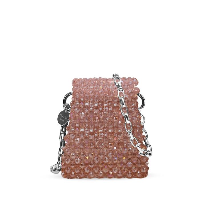 Introducing the Mini Milan N2, a petite shoulder bag that embodies elegance and style. Crafted with meticulous attention to detail, this mini-sized bag is adorned with crystals beads that add a touch of glamour to any outfit. The unlined interior provides a minimalist aesthetic while offering ample space to fit your essentials. Material: Crystals beads Unlined Height: 13 cm Width: 11 cm Depth: 5 cm Complete with a 1-meter chain Made in: Italy Fit Notes:It's the perfect size to carry your cash, cards, keys, and even your earphones.Designed and handcrafted in Italy, this exquisite piece features silver or gold hardware, allowing you to customize your look. The Mini Milano N2 offers versatility and convenience. Elevate your style with this stunning bag, to ensure you shine uniquely in every o Crystals Beads, Crystal Bags, Minimalist Aesthetic, Gold Hardware, Crystal Beads, Pink And Gold, Thing 1, Shoulder Bag, Silver