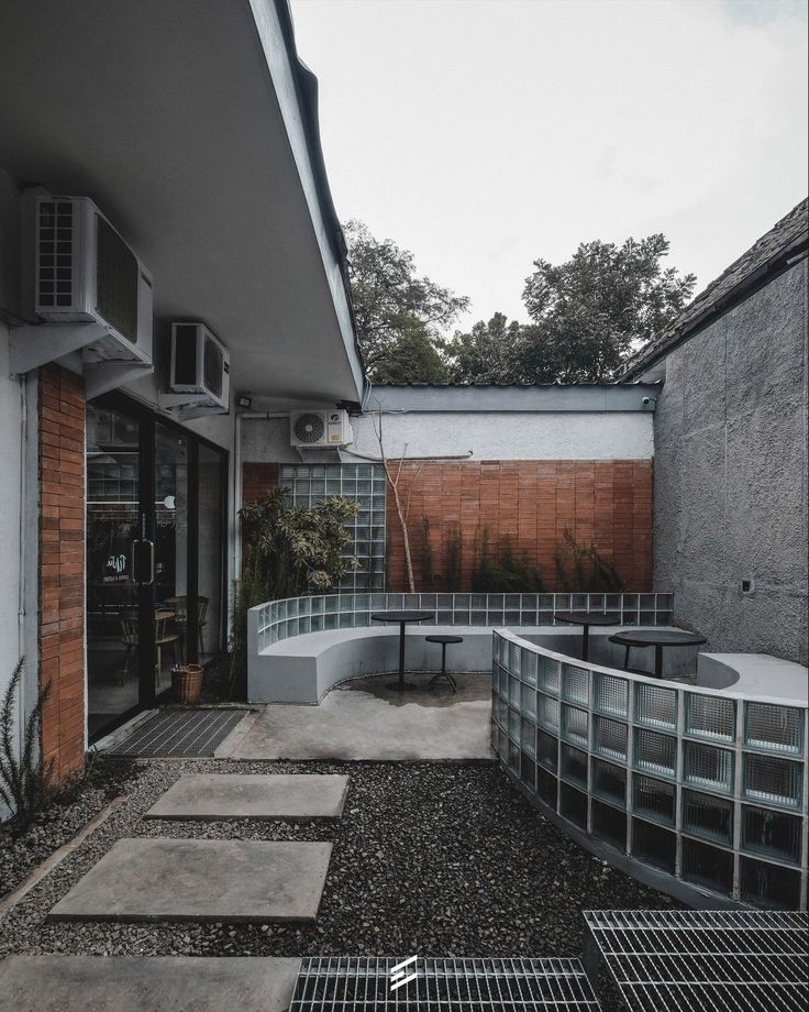 an empty courtyard with concrete steps leading up to it