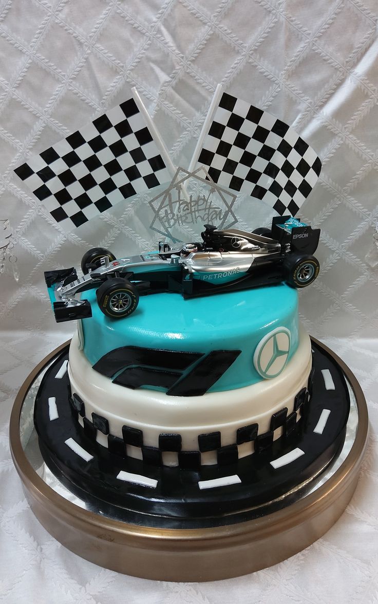 a birthday cake with a racing car on top