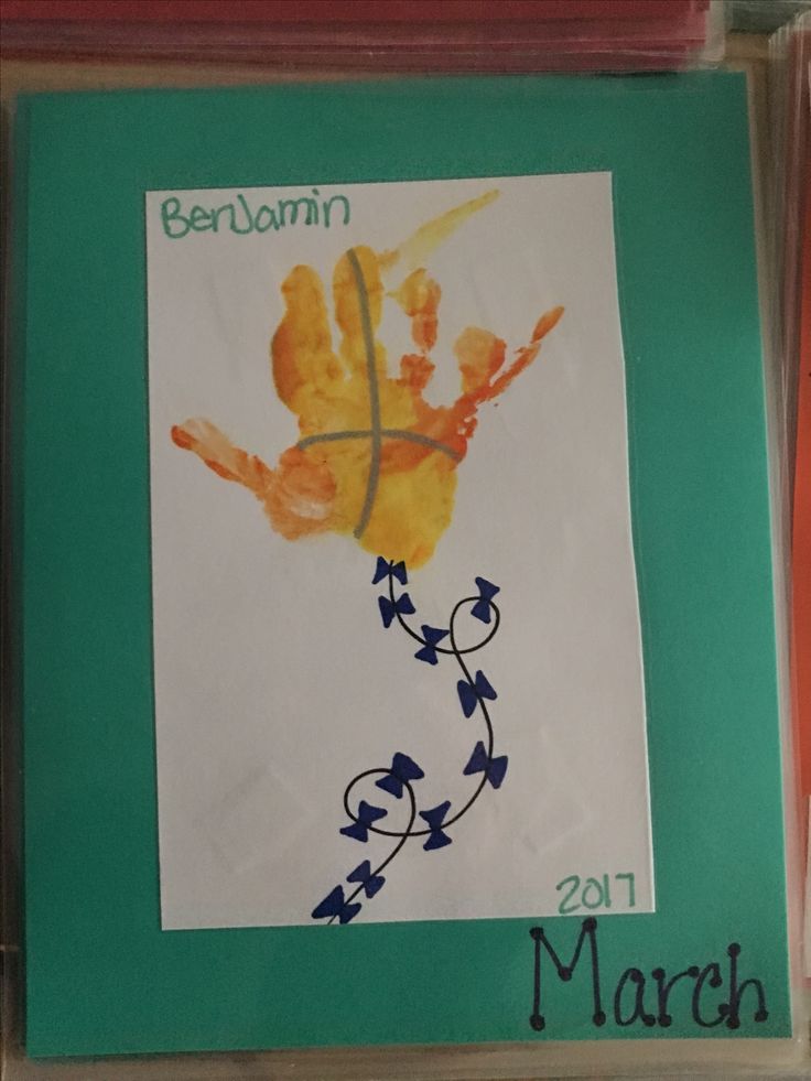 a child's handprint on a piece of paper with the name march written in it