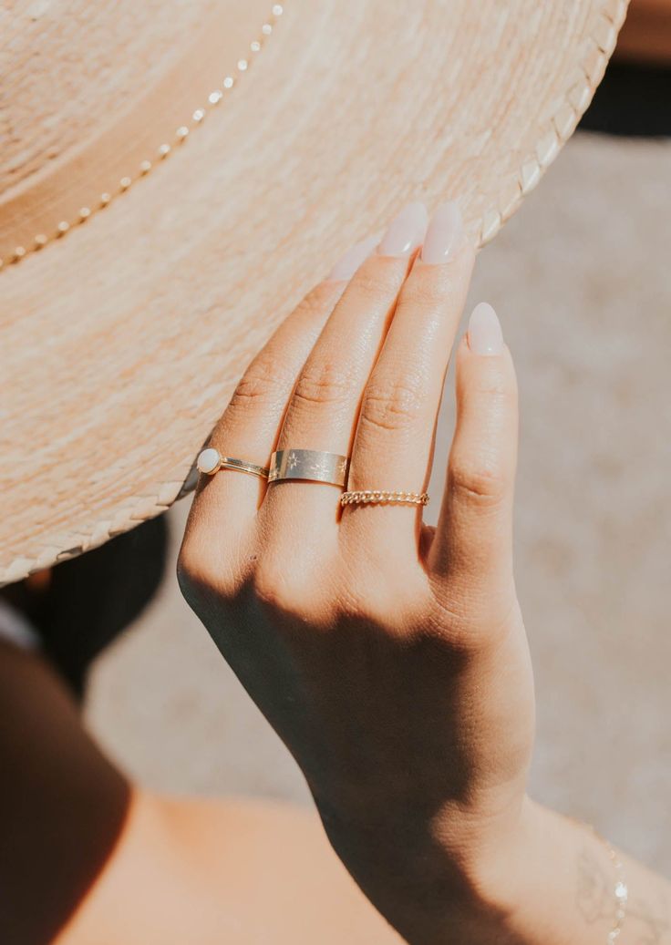 A bold band with a little extra celestial sparkle! Handmade + hand-stamped, the Starburst Ring was made as a reminder to look at the night sky as often as you can, and enjoy the clear nights when they're here. ✨ Available in three sizes and is slightly adjustable. If you're in between sizes we suggest sizing up: Small: Suggested for US size 5 and 6 Medium: Suggested for US size 7, 8 and 9 Large: Suggested for US size 10, 11 and 12 Available in 14kt Gold Fill + Sterling Silver. Handmade in Eau Cl Starburst Ring, Backdrops Necklace, Second Piercing, Zodiac Rings, Ear Party, Hoop Charms, Us Size 10, The Night Sky, Jewelry Case