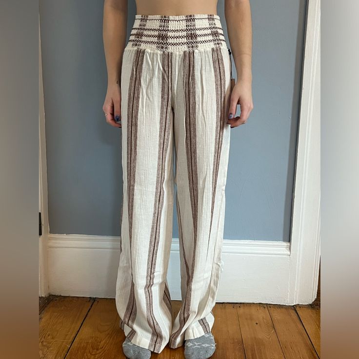 Nwt Sincerely Jules Linen Blend, Wide Leg Pants. Perfect For Spring/Summer. These Can Be Dressed Up Or Down. Fun Brown And White Striped Design. 55% Linen 45% Rayon Model Is 5’5 And Size S/4 White Cotton Pants For Beach Season, White Relaxed Fit Summer Pants, White Relaxed Fit Pants For Beach Season, White Straight Leg Bottoms For Beach Season, White Straight Leg Bottoms For Vacation, Bohemian White Bottoms For Loungewear, White Beach Pants With Elastic Waistband, White Pants With Elastic Waistband For Beach, White Bohemian Bottoms With Elastic Waistband