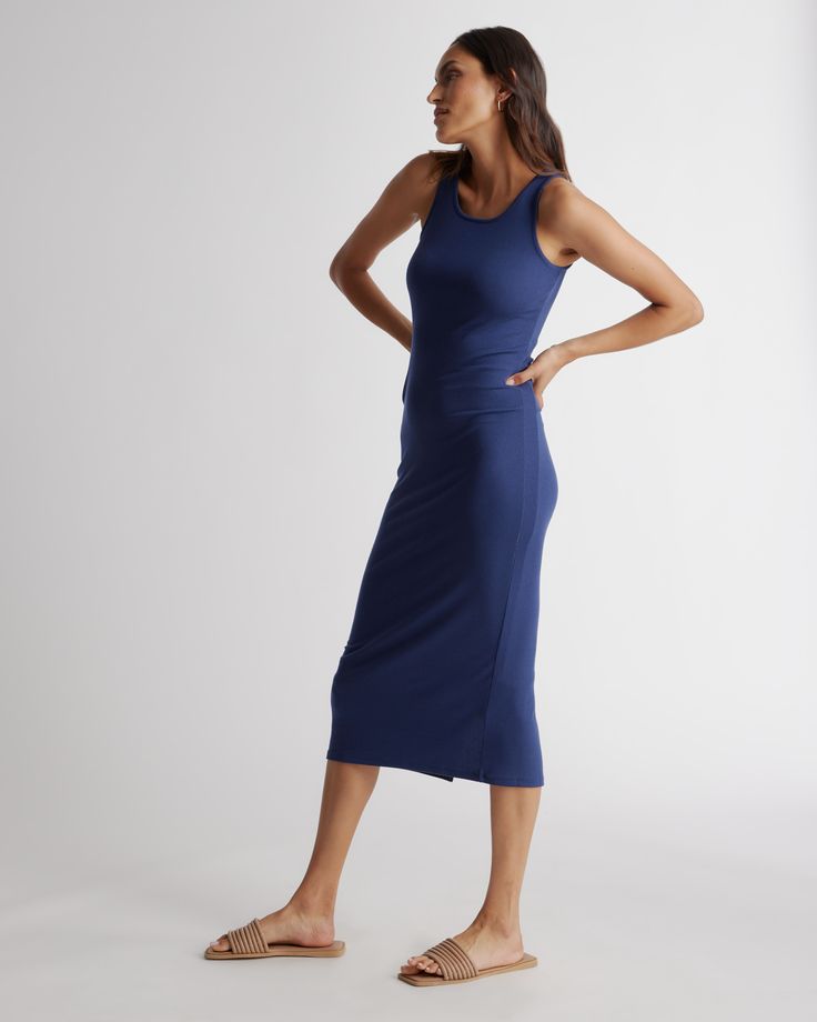 This sleeveless, scoop neck, midi-length rib knit dress is everything. So comfy and versatile, with a lot of stretch for the perfect fit, in a fabric that's drapey, pill-resistant, soft, and slimming. Tencel™ lyocell is a biodegradable fabric made from cellulose found in wood pulp. It is softer, more breathable, and uses 10-20 times less water in production compared to cotton.  | Quince | Women's Tencel Rib Knit Sleeveless Dress in Navy, Size Small Maternity Sweater Dress, Rib Knit Dress, Tencel Dress, Scoop Neck Midi Dress, Silk Tee, Navy Blue Midi Dress, Soft Dress, Long Sleeve Knit Dress, Ribbed Knit Dress