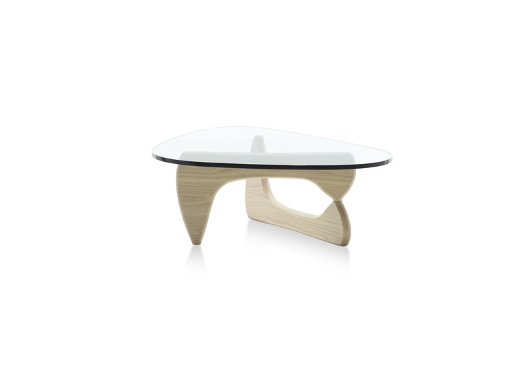 an oval glass coffee table with wooden legs and a curved design on the top, against a white background