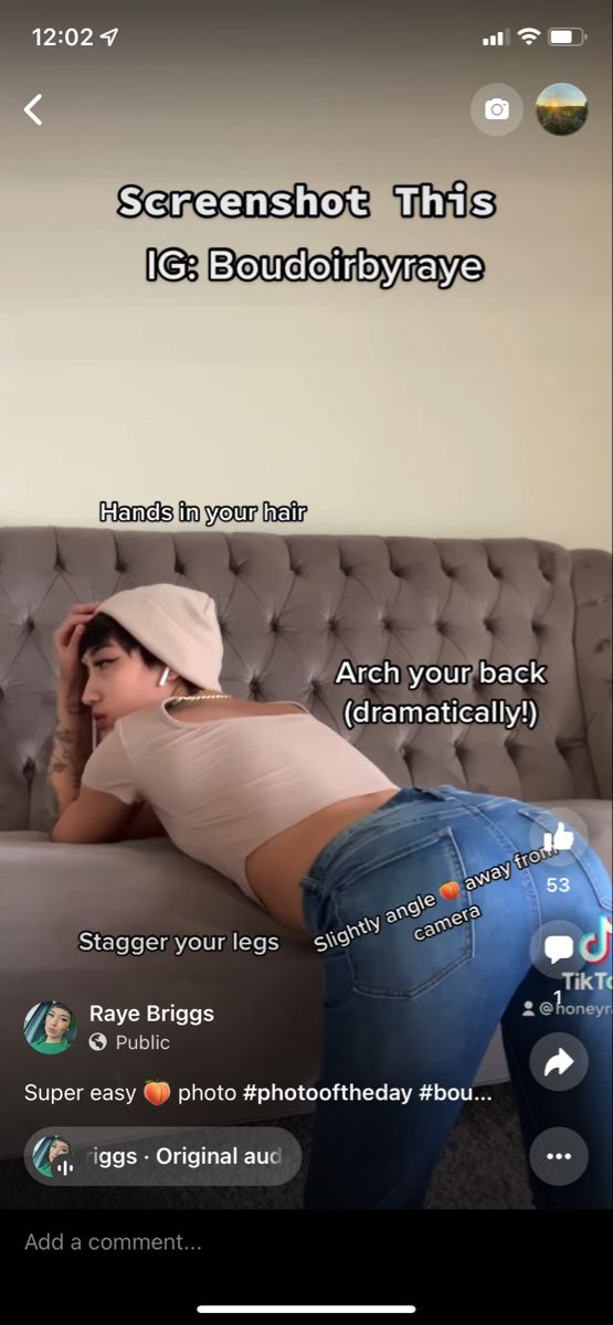 a woman laying on top of a couch in front of a wall with the caption's name