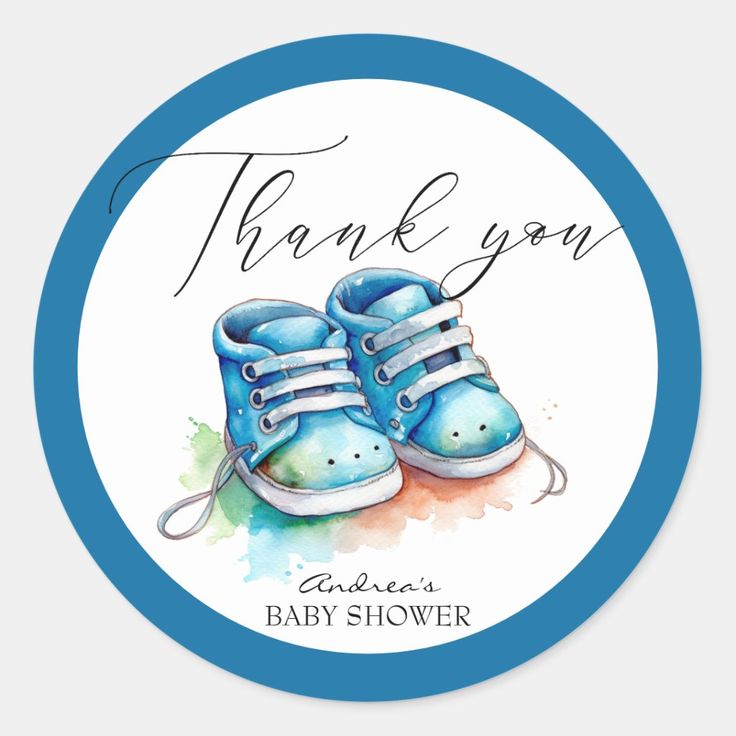 a blue baby shoe with the words thank you on it's back and in front of