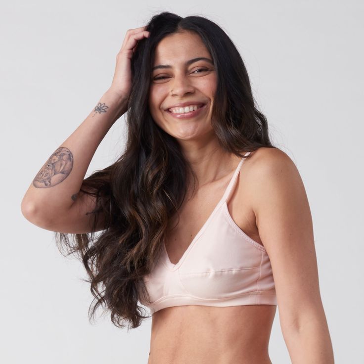 A more supportive style for larger cup sizes. Horizontal seams across the cups, fabric front straps and other thoughtful details shape and support—without sacrificing style or comfort. Designed with measurements from real women, not mannequins. Supports A-D cups. Slip-on style, no back closure. Adjustable straps with rose gold hardware. Double-layered, organic cotton with a covered elastic band. 94% organic cotton, 6% spandex. Cut and sewn in the U.S. Machine wash and dry. Size Guide Everyday Fitted Bra With Padded Cups, Everyday Bra With Padded Cups, Everyday Full Coverage Padded Nursing Bra, Fitted Nursing Bra With Padded Cups For Everyday, Fitted Nursing Bra With Removable Pads For Everyday, Everyday Fitted Nursing Bra With Padded Cups, Fitted Everyday Nursing Bra With Padded Cups, Everyday Full Coverage Bra With Padded Cups, Everyday Full Coverage Padded Bra