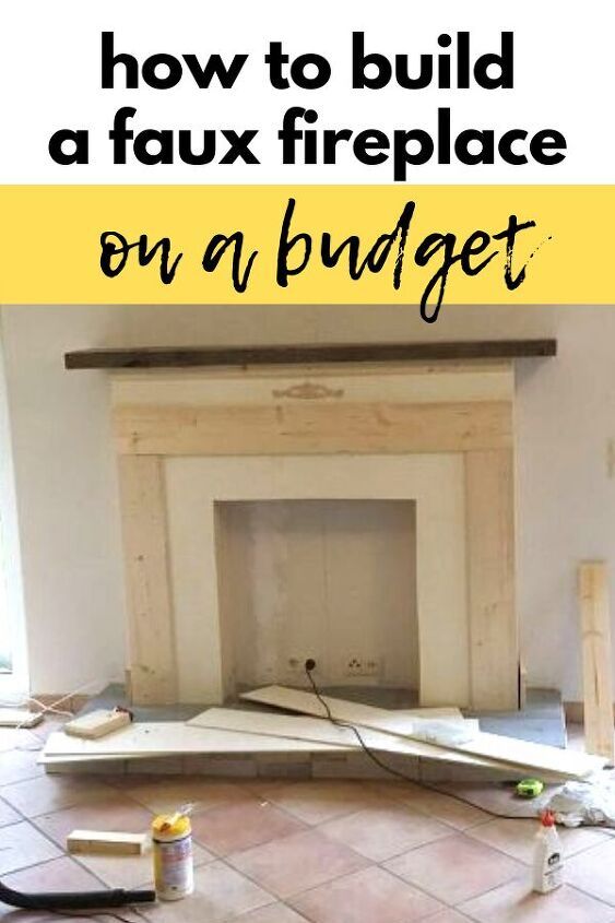 a fireplace being built with the words how to build a faux fireplace on a budget