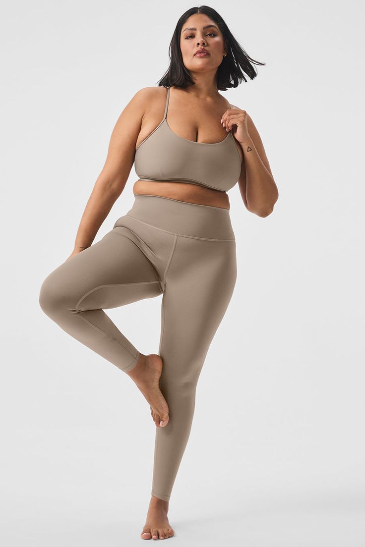 Wondering why these leggings are a fan favorite? Maybe it’s the sculpting, subtly sheeny, high-compression Airlift fabric. Or the fact that they fit like a glove, complete with a wide, double-layered waistband for a holds-you-in feel. Or the ⅞ length hems that are perfect for petites or an above-the-ankle fit. Pick your color and get ready to wear yours on repeat. Compressive Activewear With Built-in Bra For Barre, Compressive Alo Yoga Pants For Pilates, Alo Yoga Compressive Yoga Pants For Pilates, Versatile Stretch Leggings By Alo Yoga, Compressive Bra-friendly Alo Yoga Activewear, Compressive Versatile Activewear By Alo Yoga, Compressive Light Support Alo Yoga Activewear, Alo Yoga Stretch Leggings For Pilates, Functional Alo Yoga Leggings For Pilates