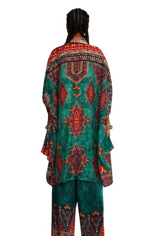 Teal green kimono cuffed sleeves collared front buttoned tunic with all over Tribal aesthetic print and mirror, multi thread hand embroidered details. - Aza Fashions Green Embroidered Kimono With Kimono Sleeves, Green Long Sleeve Bohemian Kurta, Green Bohemian Long Sets, Long Bohemian Green Sets, Green Traditional Kaftan With Kimono Sleeves, Traditional Green Kaftan With Kimono Sleeves, Festive Green Printed Kaftan, Traditional Green Kimono For Festive Occasions, Traditional Green Kimono For Festive Season