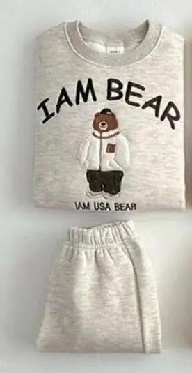 This sweet 'I Am Bear' Jogger Set is the perfect way to keep your baby looking cute and cozy! Made of soft cotton and worsted fabric, it fits true to size for 7-36 months and features a stylish cartoon pattern. With long sleeves and a pullover closure, it's perfect for spring and autumn days. Your little one will love the warmth and comfort of this adorable set! Details: Outerwear Type: Coat Material: Cotton Fabric Type: Worsted Sleeve Length: Long Fit: Fits true to size, take your normal size S