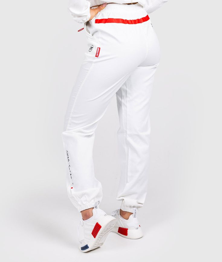 Make a statement with our Aero Track Pants, designed for comfort and versatility. They feature a loose fit for easy movement and an adjustable drawstring waist. Extra Hardtuned branding adds a touch of individuality that sets them apart from other boring athletic wear. Available in White and Black colorways. Track Pants Women, Online Promotion, Be Back Soon, Athletic Wear, Height And Weight, Track Pants, Drawstring Waist, White And Black, Loose Fitting