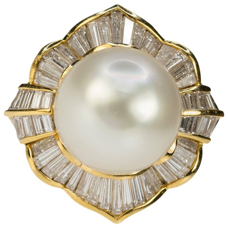 Stunning 13.5mm South Sea Pearl set in 18k yellow gold ring with 46 bagueete diamonds weighing approximately 2.00 carats. South Sea Pearl Ring, Pearl Diamond Ring, Bijoux Art Nouveau, Pearl Jewelry Design, Diamond Ice, Real Gold Jewelry, Pearl And Diamond Ring, Pearl Jewellery, Diamond Ring Settings