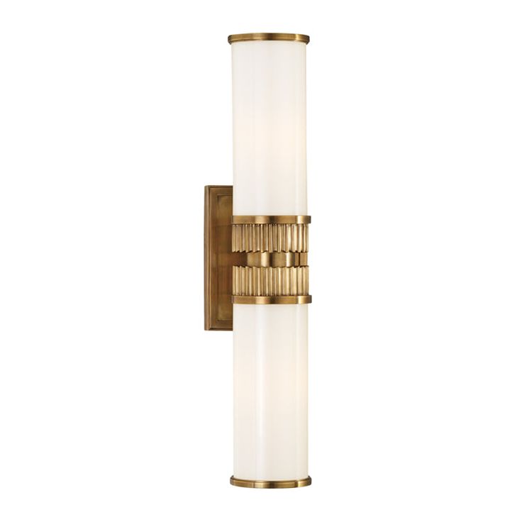 an image of a wall light that is on the side of a white wall with gold trim