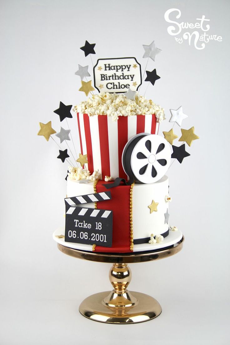 a birthday cake decorated with popcorn and stars