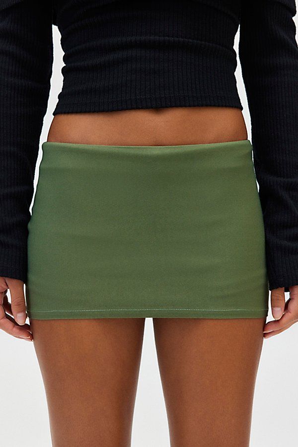 Effortless staple Silence + Noise skort in a slim, micro mini length. Designed in a soft & stretchy knit featuring a low-rise waistline and built-in shorts. Find it only at Urban Outfitters. Features Silence + Noise Piper micro skort Low rise mini skort Soft & stretchy knit Low rise waistline Slim fit Micro mini length Shorts lining Easy pull-on style UO exclusive Content + Care 76% Viscose, 21% nylon, 3% spandex Machine wash Imported Size + Fit Model in Green is 5’9" and wearing size Small Meas Stretch Casual Elastane Skort, Casual Stretch Elastane Skort, Fitted Elastane Mini Skirt In Solid Color, Fitted Mini Skort In Solid Color, Fitted Mini Skort Solid Color, Fitted Hip-length Mini Skirt For Spring, Trendy Stretch Skort With Short Inseam, Basic Fitted Summer Bottoms, Fitted Basic Summer Bottoms