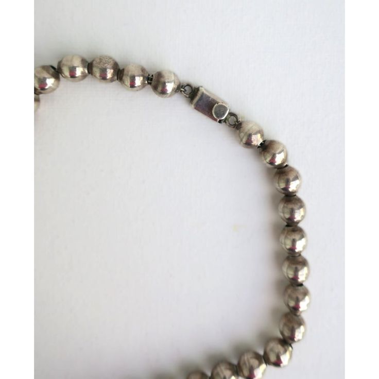 A beautiful sterling silver ball bead necklace, circa mid-20th century, Mexico. Mexican sterling silver pieces are known for their great craftsmanship and quality. Perfect as a standalone piece (as shown in images), or stacked/combined with other necklaces - sterling, gold, pearls, etc. A great piece to mix and match with. With markers' mark on push button clasp as shown in last image; Mexico 925 (for sterling silver.) Necklace is 18.25" long.   Italian sterling silver puffed heart necklace show Puffed Heart Necklace, Puffed Heart, Silver Pieces, Sterling Silver Necklace, Push Button, Bead Necklace, Heart Necklace, Sterling Silver Necklaces, 20th Century