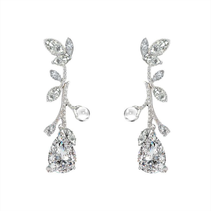 Diamond Citrus Vine Earrings | Over The Moon Luxury Diamond White Earrings With Gemstones, Luxury White Diamond Crystal Earrings, Luxury White Topaz Earrings For Wedding, Luxury Formal Earrings With Stone Setting, Luxury White Gold Gemstone Cluster Earrings, Luxury Brilliant Cut Linear Earrings For Evening, Luxury Silver Linear Earrings With Diamond Accents, Movie Jewelry, Jewelry 2024