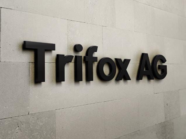 the logo for trifox ag is displayed on a wall