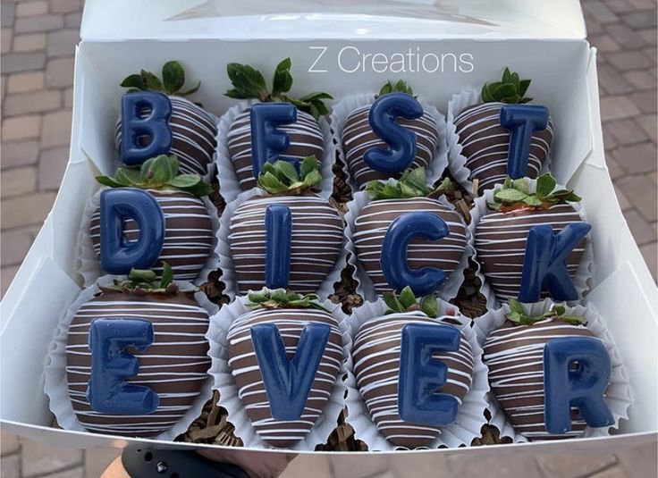 chocolate covered strawberries are in the shape of letters