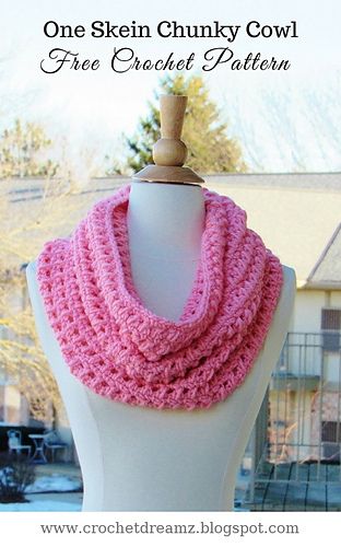 a pink crochet cowl on top of a white mannequin