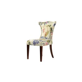 an upholstered chair with floral fabric on the back and legs, against a white background