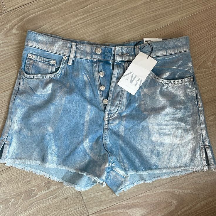 New Zara Size 12 High-Rise Split Shorts Light Blue Denim With Silver Metallic Sheen Button Up Frayed Bottom Keywords Only Denim Jean Shorts Summer Casual Travel Zara Shopping Travel Comfort Style Metallic Silver Summer Washed Blue Bottoms With Button Closure, Blue Shorts With Button Closure For Spring, Trendy Summer Jeans With Button Closure, Zara Casual Jeans With Buttons, Trendy Jeans With Button Closure For Summer, High Waist Blue Jean Shorts With Button Closure, Summer Denim Blue Jeans With Button Zip Fly, Denim Jean Shorts With Button Zip Fly For Summer, Denim Shorts With Button Closure For Summer