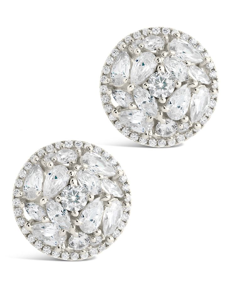 These fun, celebrity-inspired Zara Circle Studs will make you feel like a movie star! Featuring a unique CZ stone design, you can wear these flashy statement earrings on the red carpet and turn heads like the gorgeous A-listers you admire. Unforgettable glam, coming your way! Materials: 14K gold or rhodium plated brass, cubic zirconia Features: 0.6" stud, 1mm-5mm stones, Lead & Nickel free, hinged post back Silver Glamorous Cluster Earrings For Party, Glamorous Cubic Zirconia Cluster Earrings, Dazzling Cluster Earrings For Party, Glamorous Cluster Earrings With Sparkling Stones, Glamorous Sparkling Cluster Earrings For Party, Glamorous Party Cluster Earrings With Sparkling Stones, Round Cluster Earrings With Sparkling Stones For Party, Sparkling Stones Cluster Earrings For Party, Glamorous White Cluster Earrings For Party