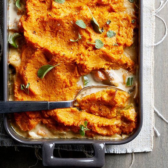 a casserole dish with meat, cheese and herbs in it is ready to be eaten