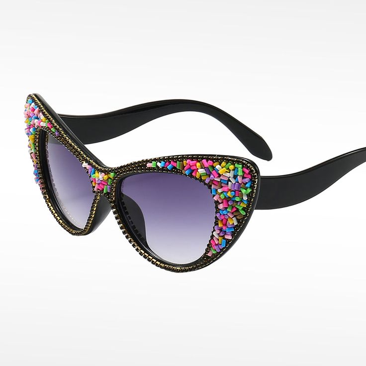 Introducing the all-new Jewel embellished update to our fave Kandi glasses! We can't get enough of these right now!Get ready to shine with our Kandi Lux sunglasses - the trendiest and most unique sunglasses you'll find. With their designer-inspired look, you'll stand out from the crowd wherever you go! Perfect Fit - Soft adjustable nose pads, spring hinges, flexible arms make the sunglasses very comfortable to wear. Original & Elegant - Our sunglasses are durable and fashionable and fit for ever Fun Black Sunglasses For Parties, Modern Plastic Sunglasses For Party, Modern Plastic Sunglasses For Parties, Summer Party Polarized Cat Eye Sunglasses, Spring Party Cat Eye Sunglasses With Glass Material, Spring Party Cat Eye Sunglasses With Glass Lenses, Spring Party Cat Eye Sunglasses, Fun Sunglasses With Gradient Lenses For Parties, Party Cat Eye Sunglasses With Mirrored Lenses