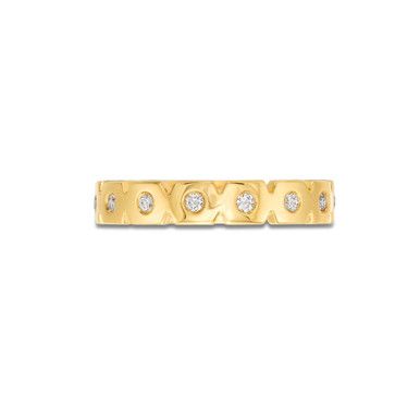 a gold ring with diamonds on it