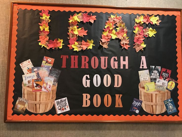 a bulletin board with flowers and leaves on it that says, let's through a good book