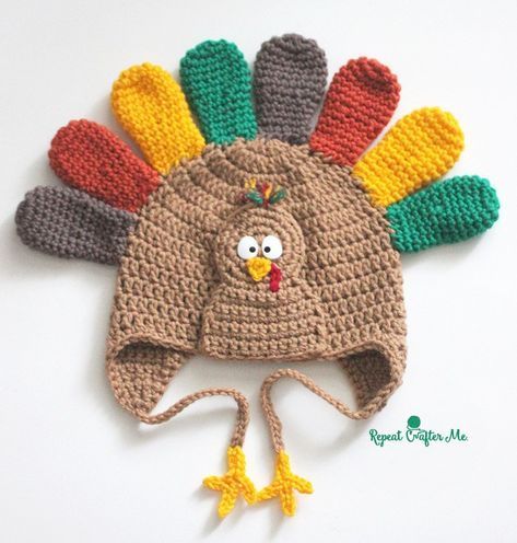 a crocheted turkey hat on a white surface