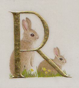 the letter r is made up of two rabbits in grass and one bunny has it's tail curled back