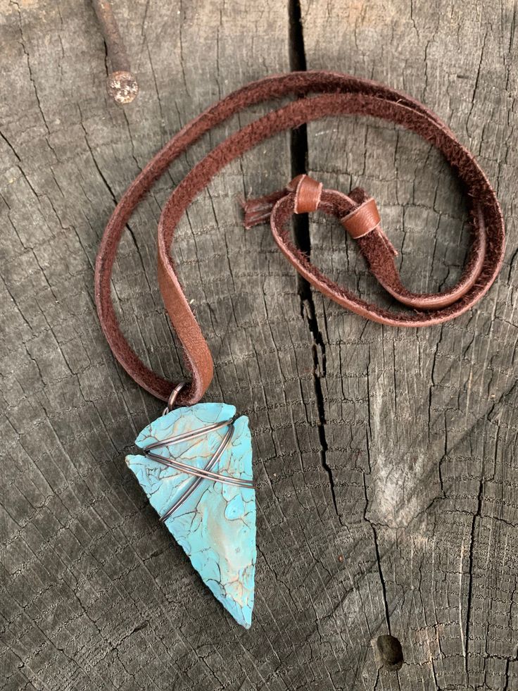 "This is my fresh spin on a wire wrapped classic. Arrowheads have been worn as jewelry for ages and are a recognizable symbol of alertness, walking the straight and narrow & strength. The arrowhead I used is made of jasper stone and is a hand knapped modern replica. It was made in the same tradition and with the same primitive techniques that early man used. I added a lovely pale turquoise & gold highlight patina then wire wrapped it with blackened (oxidized) copper wire. This is a great Southwestern Hand Wrapped Adjustable Jewelry, Adjustable Southwestern Hand Wrapped Jewelry, Southwestern Adjustable Hand Wrapped Jewelry, Adjustable Southwestern Style Hand Wrapped Jewelry, Adjustable Vintage Turquoise Necklace Gift, Vintage Adjustable Turquoise Necklace For Gift, Adjustable Vintage Turquoise Necklace For Gift, Southwestern Style Adjustable Pendant Jewelry, Handmade Adjustable Vintage Turquoise Necklace