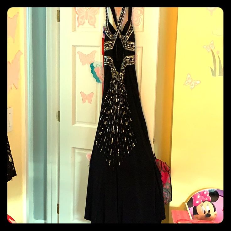 Black Embellished Evening Gown. Mermaid Fit With Tail Fitted Black Holiday Gown, Black Embellished Evening Gown, Black Embellished Gown For Evening, Black Holiday Gown Floor-length, Black Evening Gown For Holiday, Black Floor-length Gown For Holidays, Black Floor-length Holiday Gown, Holiday Black Floor-length Gown, Black Floor-length Evening Dress For Homecoming