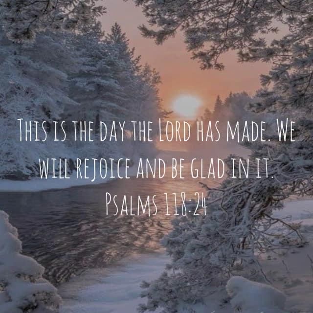 snow covered trees and water with the words, this is the day the lord has made we