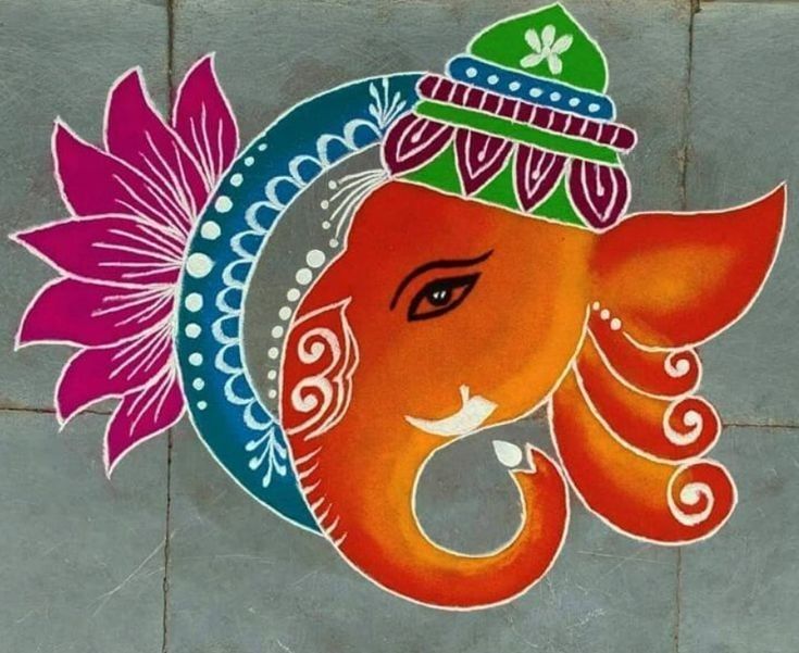 an elephant painted on the ground with flowers