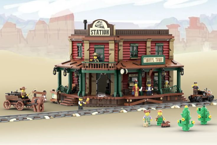 a lego model of a western town with horses and carriages