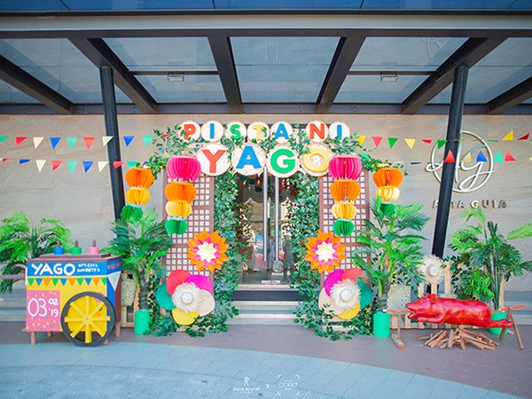 an entrance to a building decorated in bright colors