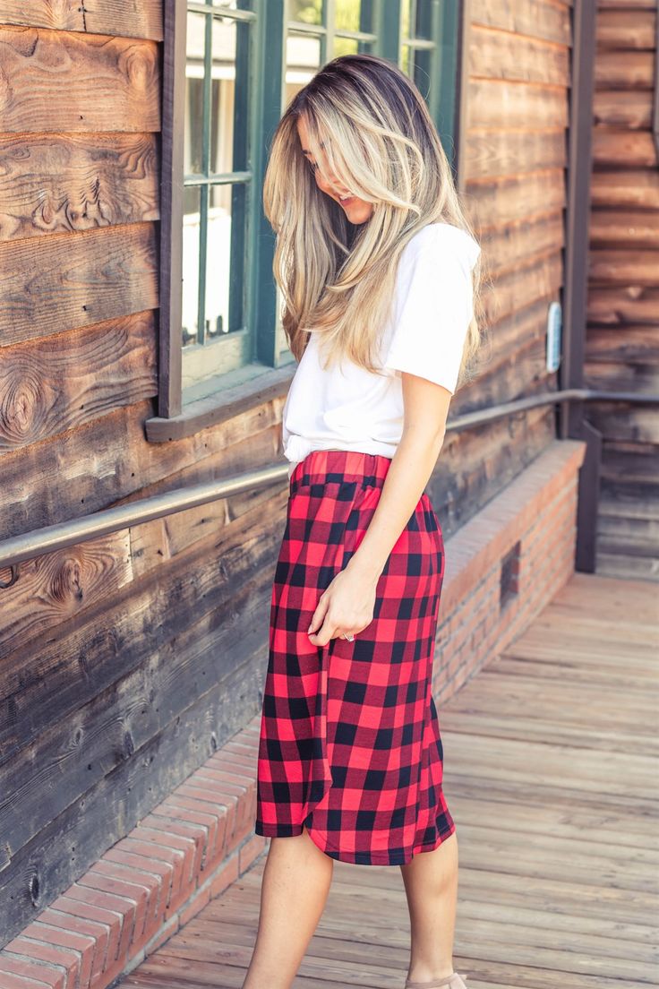 Looking for a weekend skirt that's both cozy and stylish? Look no further than our Buffalo Plaid Weekend Skirt! This skirt is the perfect combination of cute and comfortable, with a knee-length cut and a self-tie waistband that'll keep you feeling feminine and put-together all day long. Whether you're running errands or meeting up with friends for brunch, this skirt is sure to turn heads. And with sizing options ranging from S to 3X, it's easy to find the perfect fit for your body type.So why wa Casual Maxi Skirt With Elastic Waistband For Loungewear, Casual Maxi Skirt For Loungewear, Lined Skirt For Loungewear, Casual Cotton Bottoms For Holiday, Casual Long Skirt For Loungewear, Casual Flowy Maxi Skirt For Loungewear, Cotton Maxi Skirt For Fall Day Out, Elastic Waistband Midi Skirt For Loungewear, Flowy Skirt For Day Out In Fall