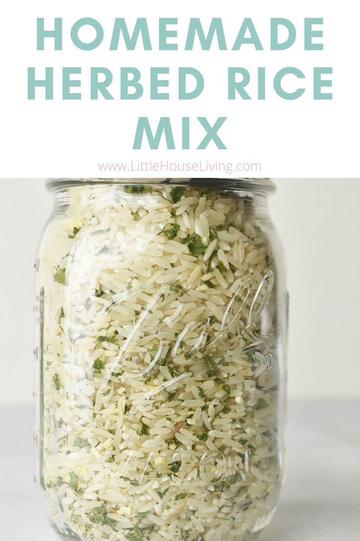 a jar filled with rice and herbs on top of a white table next to text that reads homemade herbed rice mix